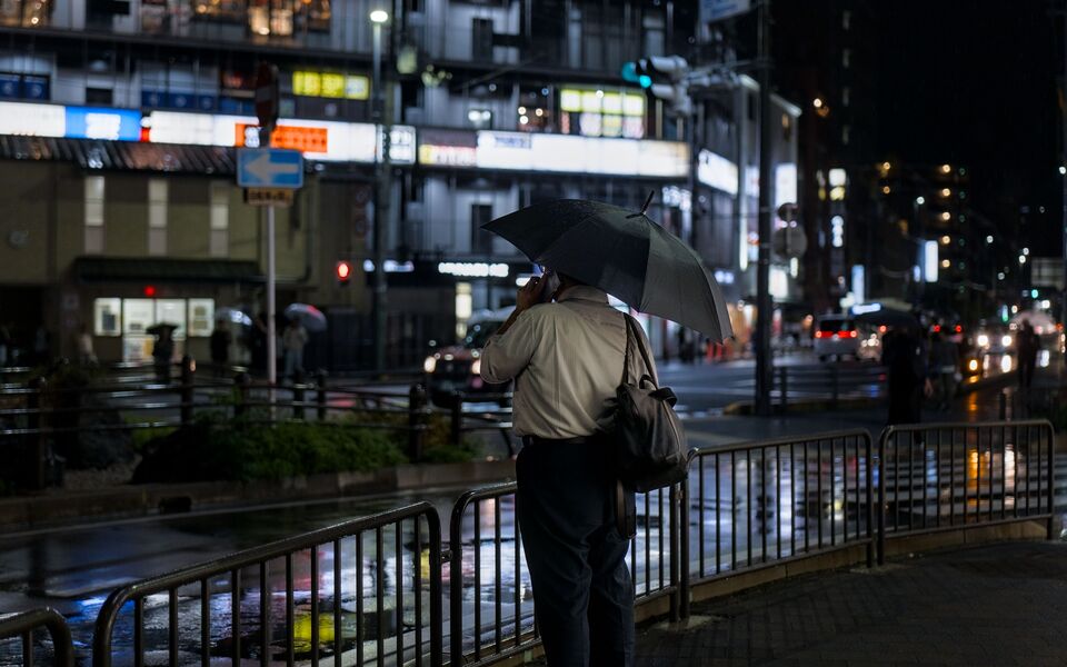 Wet-weather commuter walking in the rain